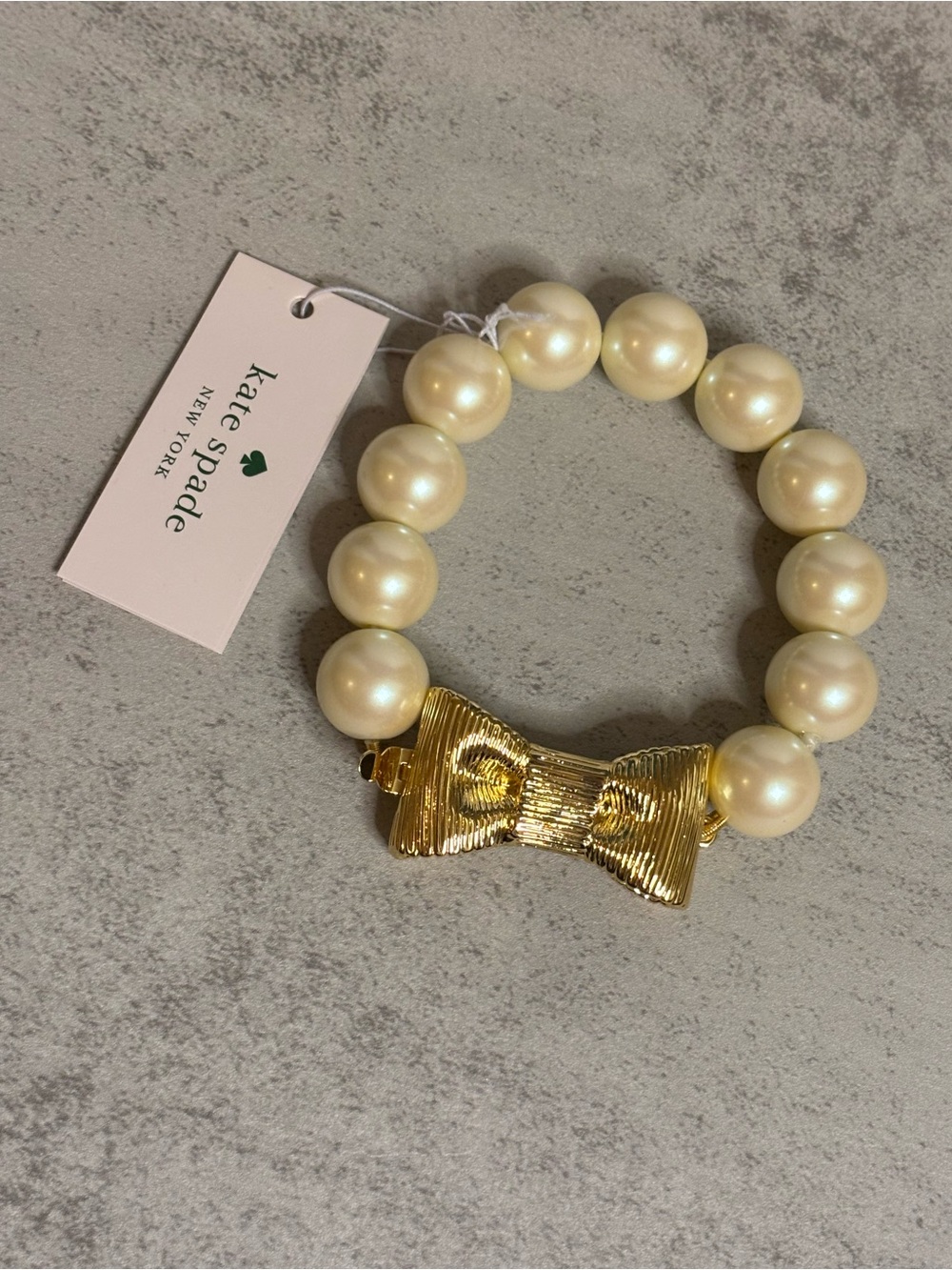 Kate Spade All Wrapped Up Faux Pearl Bracelet with Gold Bow Closure